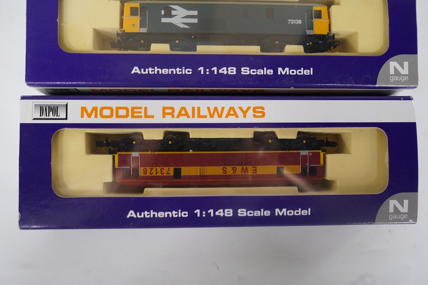 Three boxed Dapol N gauge railway Class 73 electro-diesel locomotives; 73101 The Royal Alex (ND-011b), 73138 (ND008) and 73128 (ND005). Condition - good.